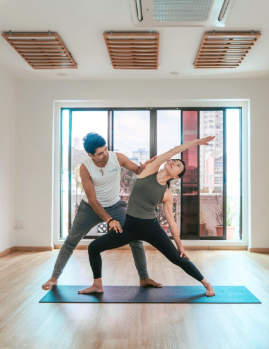 Jal Yoga studio — instructor and student